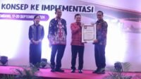 Pj. Bupati Banyuasin Terima Penghargaan Penanggulangan AIDS-TBC- MALARIA Tahun 2024